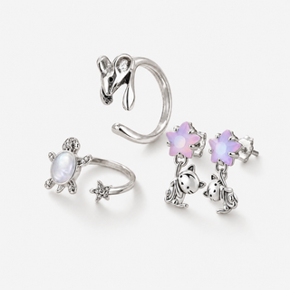 Animal Stories jewellery collection made from animal-inspired sterling silver charms on a neutral F5F5F5 background