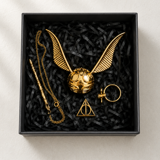 Golden Snitch Gift Set contents arranged in gift box