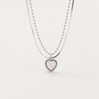 The Aurora Heart Layered Necklace Set on a neutral F5F5F5 background