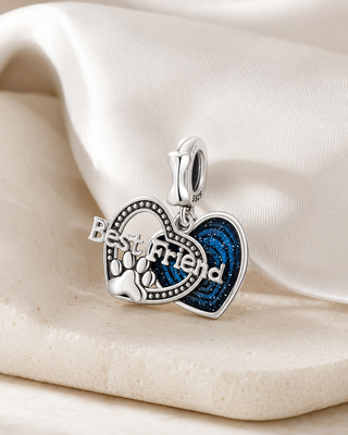 The Best Friend Paw Charm story image on ivory silk and pale stone