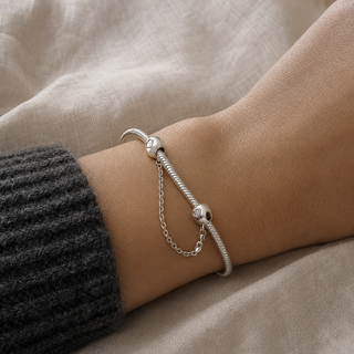 The Guardian Safety Chain fitted to a charm bracelet