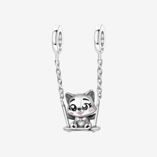 The Little Swing Cat Charm on Sworn London f5 background