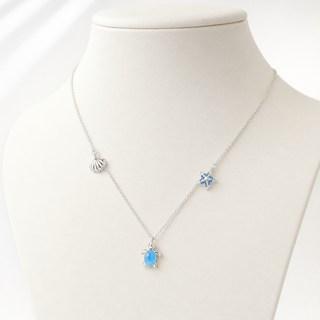 Ocean Stories Necklace shown on an ivory jewellery bust