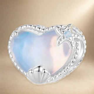 Close detail of Opal Shell Heart Charm in 925 sterling silver