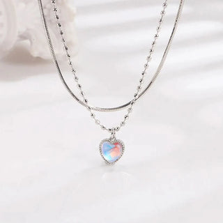 Necklace with a heart-shaped pendant on a light background