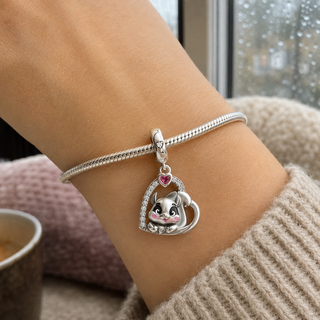 Safe Place Squirrel Charm worn at realistic scale on a silver charm bracelet