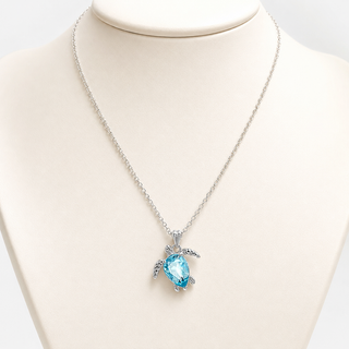 Sea Turtle Necklace shown on an ivory jewellery bust