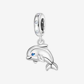 The Silver Dolphin Charm on Sworn London f5 background