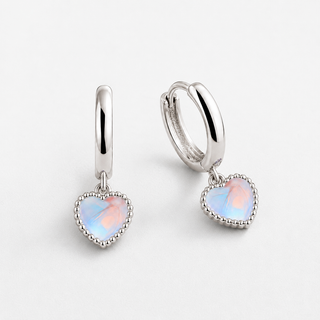 The Afterglow Heart Earrings on a neutral F5F5F5 background