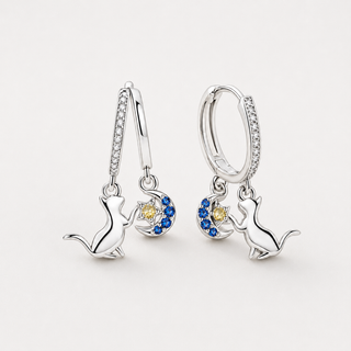 The Moonlit Cat Earrings on a neutral F5F5F5 background
