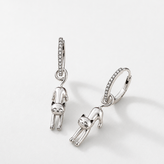 The Sunday Stretch Cat Earrings on a neutral F5F5F5 background