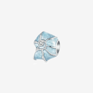 The Tidepool Nacre Spacer Charm in blue mother-of-pearl and recycled sterling silver