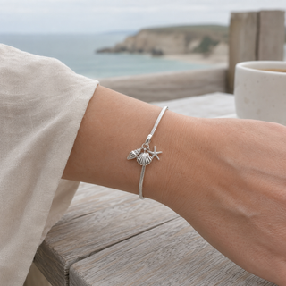 Tides Remember sea charm worn at realistic scale