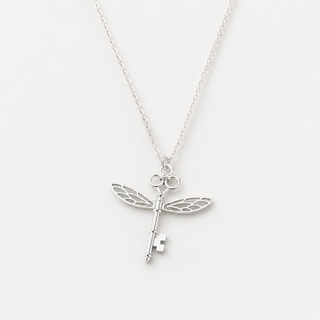 The Winged Key Necklace on a neutral F5F5F5 background